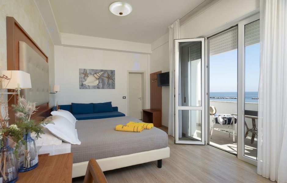 Fly to Rimini. Stay Beachfront at Hotel Elios.