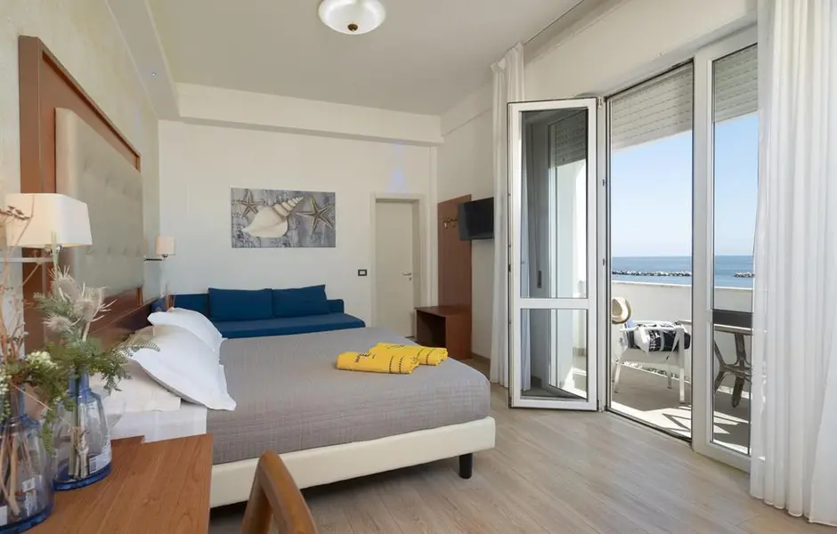 Fly to Rimini. Stay Beachfront at Hotel Elios.
